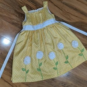 Yellow dress with white polka dots and flowers